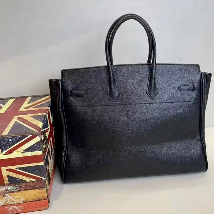 Black leather men's multipocket travel bag tote with sturdy handles from Travellers Hat Boutique