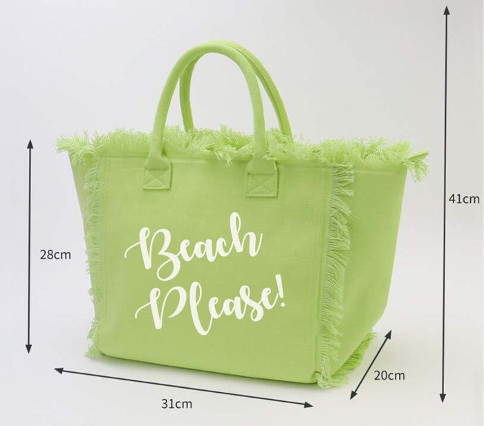 Light green personalized canvas tote with fringe featuring Beach Please text and double handles