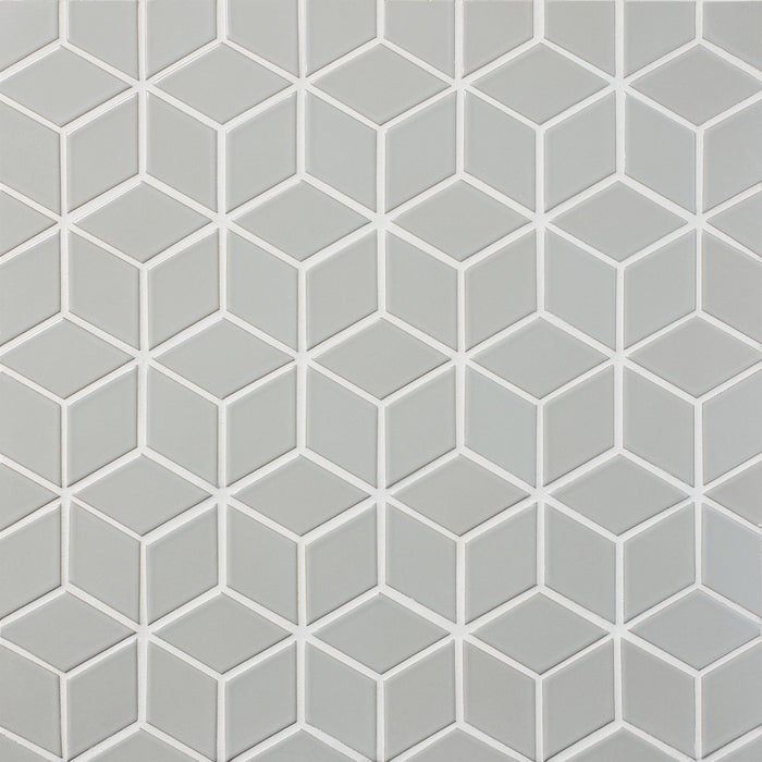 Caption: Classic Field Little Diamond in G2.2 Light Grey Whale. Prism Cape Grey grout by Custom Building Products.