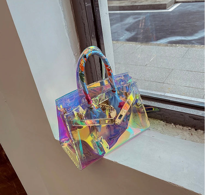 Holographic clear tote bag with colorful iridescent finish and floral wrapped handles by Travellers Hat Boutique