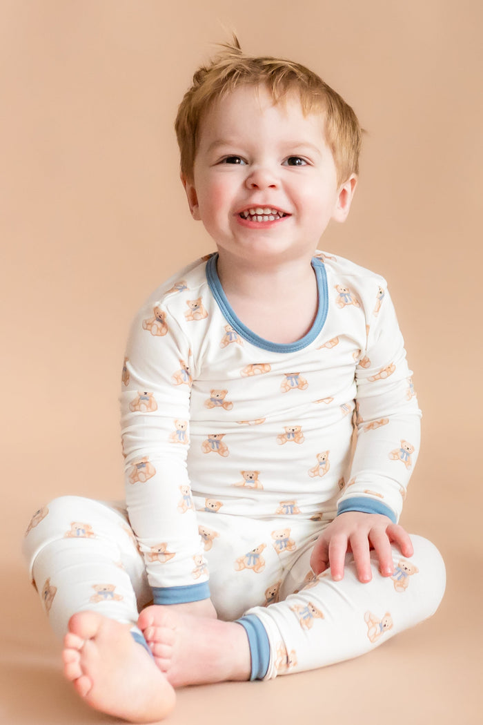 Boy wearing Long Sleeve Kids Pajamas in Teddy Bear print
