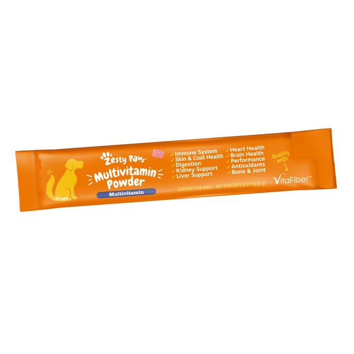 Orange packet of Zesty Paws Multivitamin Powder for dogs with white text and dog silhouette graphic.