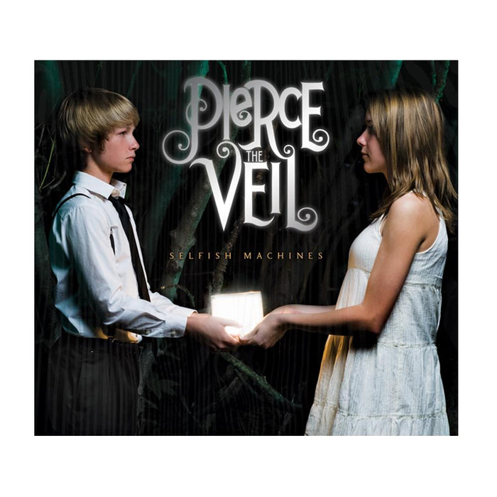The background of this album is a dark forest. On the left of the album is a boy in a white shirt and black tie, and on the right is a girl in a white dress. They are holding onto a white glowing cube in the middle of the album. In the middle of the album reads PIERCE THE VEIL in large white letters, below it reads SELFISH MACHINES in small green letters.