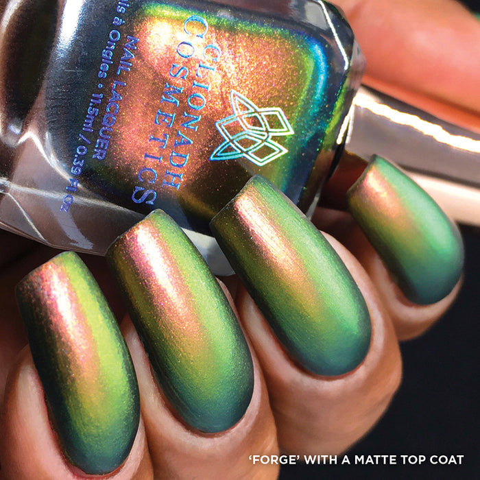 Close up of nails done with Forge Nail Lacquer with a matte top coat on medium skin tone
