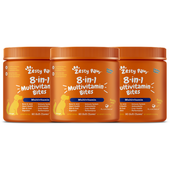 Three orange Zesty Paw containers of 8-in-1 Multivitamin Bites for dogs with white text and paw logo.