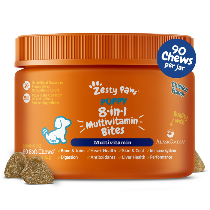 Orange jar of Zesty Paw puppy multivitamin bites with blue label and two soft chew samples in front.