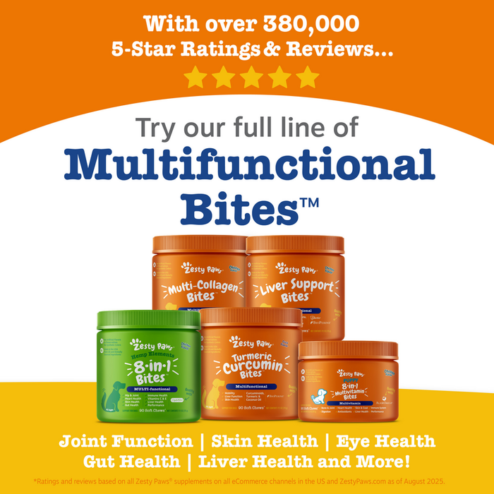 Four bottles of Zesty Paws multivitamin bites for puppies in green and orange containers displayed against orange and yellow