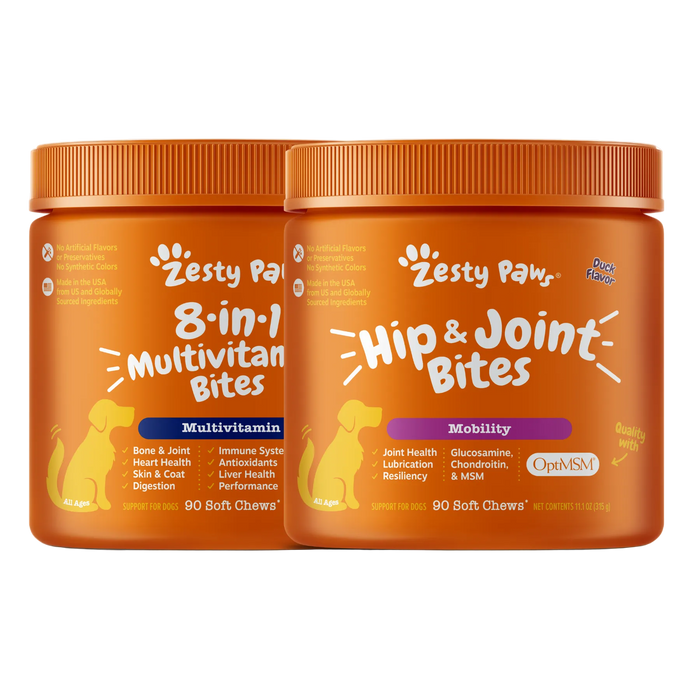 Two orange jars of Zesty Paws pet supplement on a white background
