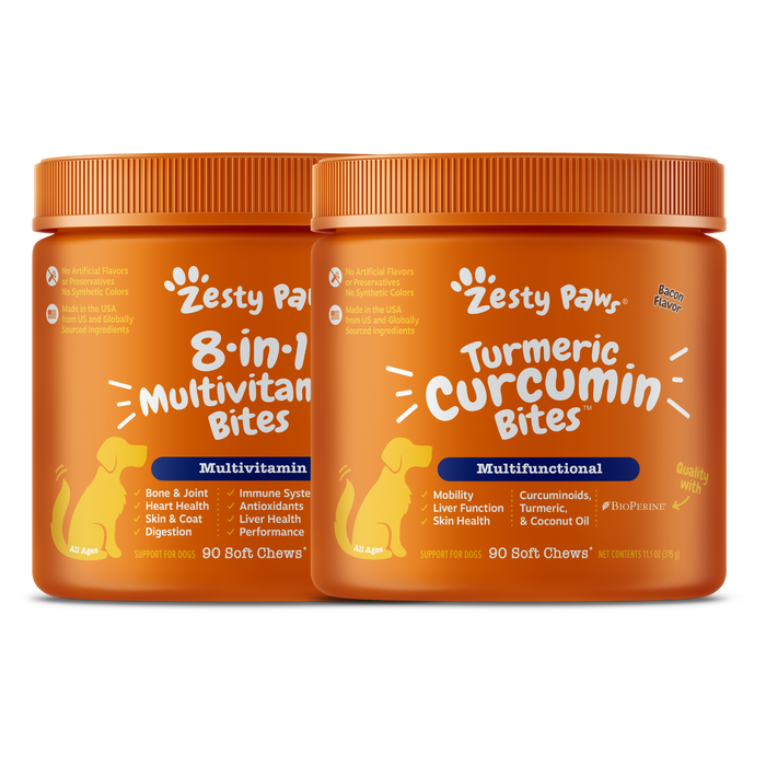 Two orange bottles of Zesty Paw dog supplements: 8-in-1 Multivitamin Bites and Turmeric Curcumin Bites, 90 soft chews each.