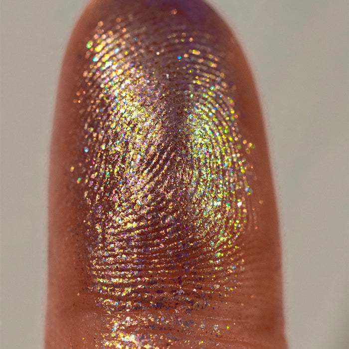 Close-up finger swatch of Ascension Pigment on fair skin tone.