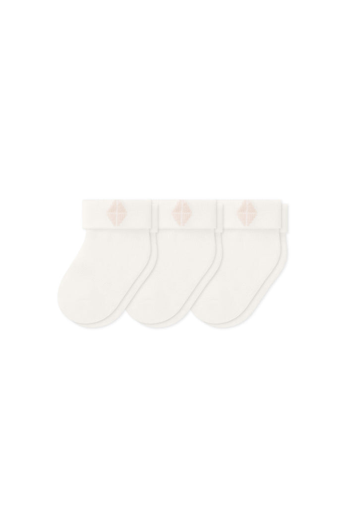 Three socks in Cloud laying flat on a white background.