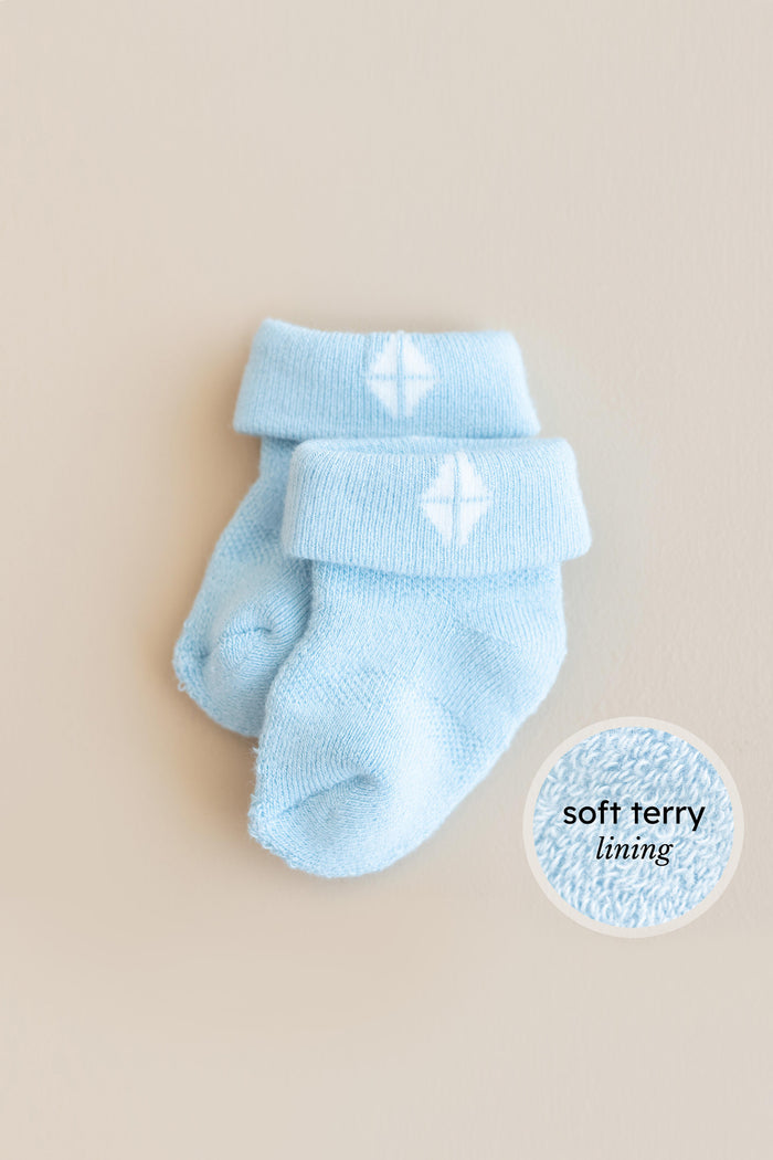 Blue infant socks with soft terry lining