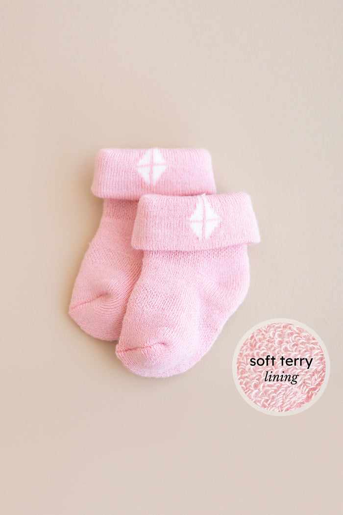 Pink infant socks with soft terry lining
