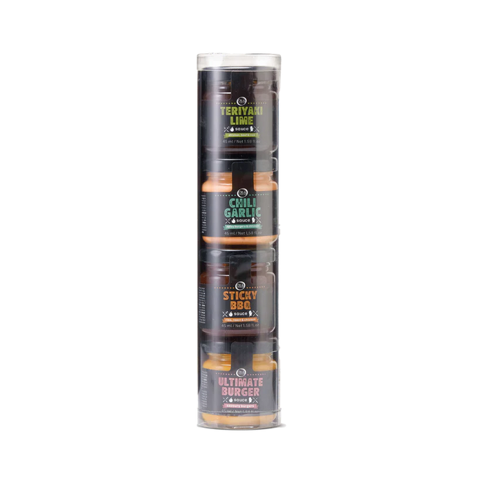 A clear plastic tube containing four small jars of different colored sauces. Each sauce bottle is labeled with a different flavor name.