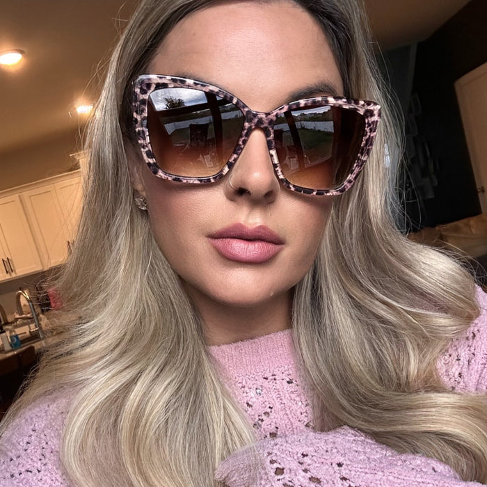 lifestyle - music mellie wearing becky ii leopard print cat eye sunglasses with dusty pink knit sweater - UGC