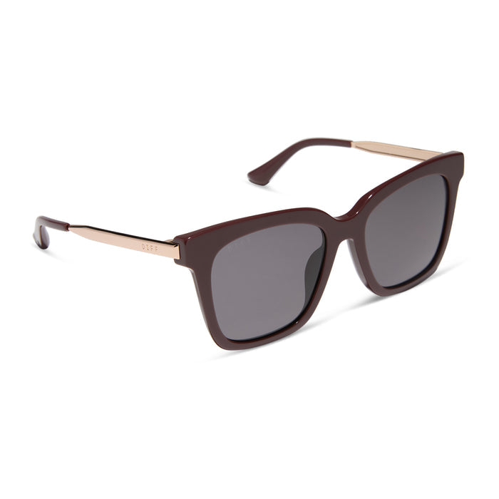 diff eyewear bella oversized square sunglasses with a rugby red acetate and gold metal frame with grey lenses angled view