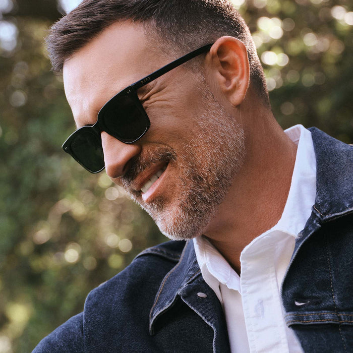 on model - male wearing Billie sunglasses with black frame and grey polarized lens