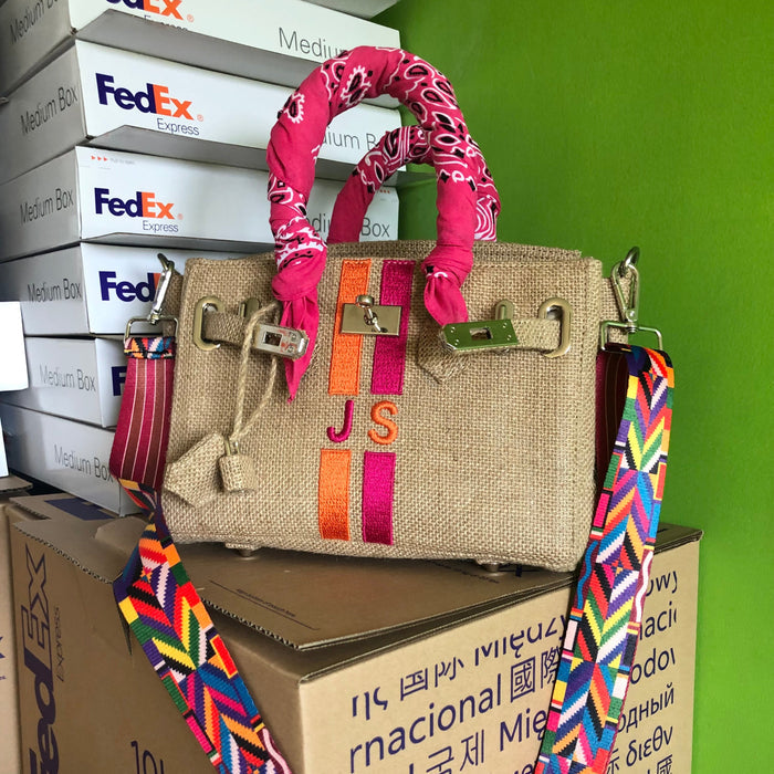 Burlap O'Kelly handbag tote bag with colorful striped handles and vibrant embroidered initials JS