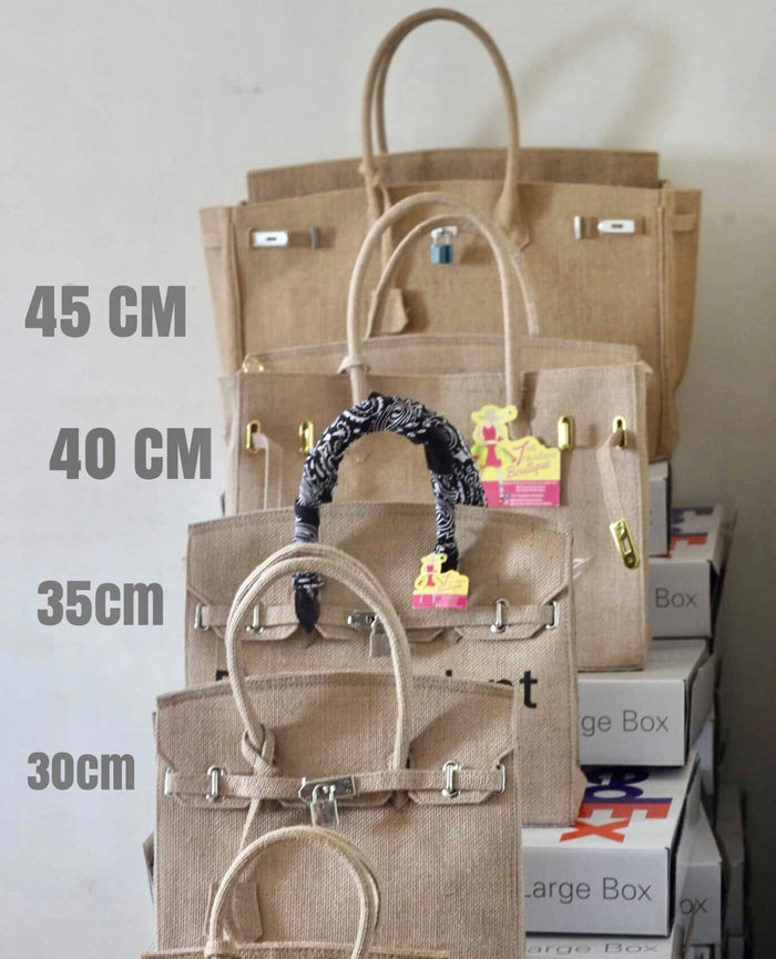 35cm printed burlap bag from Travellers Hat Boutique displayed among larger burlap handbags with sturdy handles