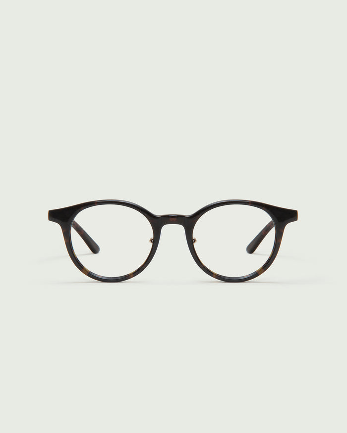 Dark Tort::Caine Eyeglasses round tort acetate front
