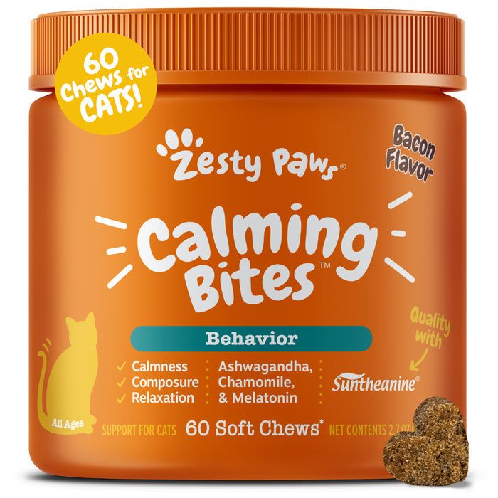 Orange jar of Zesty Paws Calming Bites for cats with yellow seal, bacon flavor label, and soft chew visible.