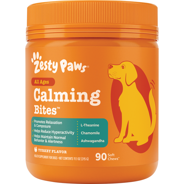 Orange plastic jar of Zesty Paws Calming Bites dog treats with yellow and red dog illustration and orange screw-top lid.