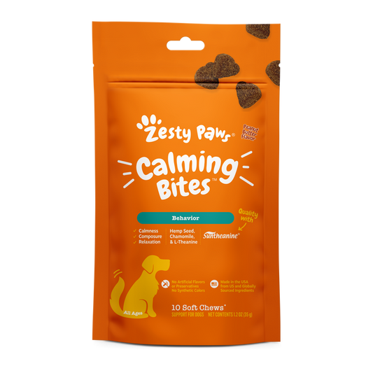 Orange Zesty Paw Calming Bites pouch with white text, paw logo, and yellow dog silhouette, containing 10 soft chews.