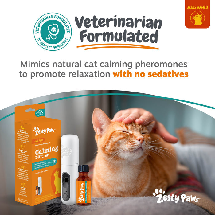 White diffuser device with amber essential oil bottle and orange packaging box displayed next to relaxed orange cat.