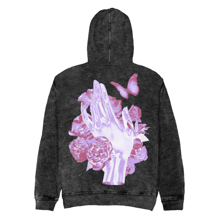 Back of A Greyish Black hoodie with a purple hand surrounded by butterflies and flowers which are also purple.