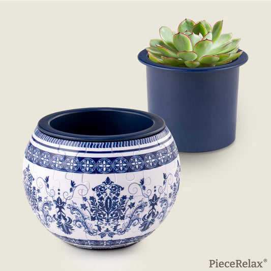 Drawing from Eastern floral tiles and echoing the elegance of blue-and-white porcelain, the PieceRelax puzzle planter radiates classical beauty. Allow your creativity to blossom with PieceRelax, where each plant finds its perfect place within the allure of this stunning puzzle plant pot.