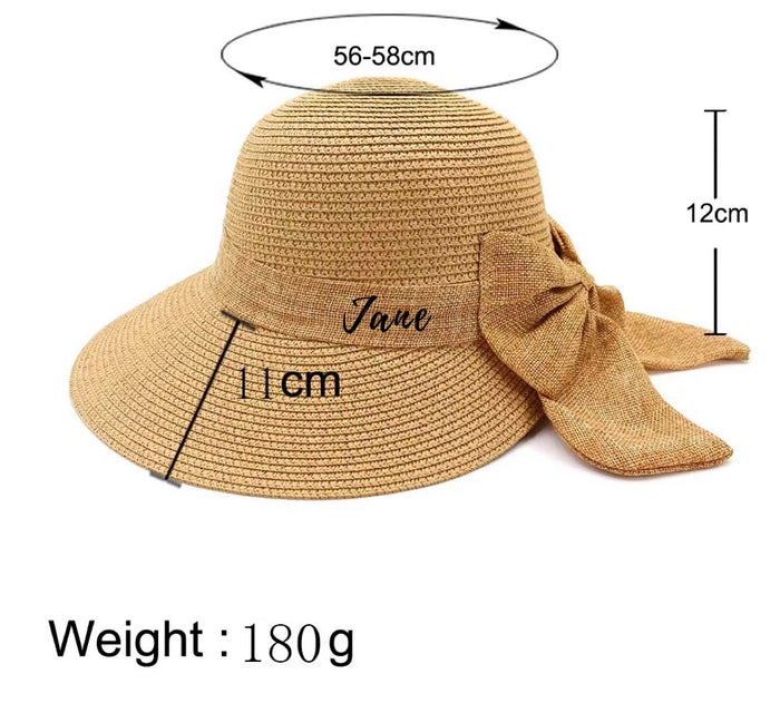 Personalized straw hat for women with wide brim and decorative bow from Travellers Hat Boutique