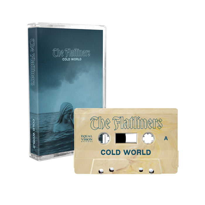 The Flatliners Cold World bundle includes a cassette tape and case, featuring album art of a submerged statue under a cloudy sky. The exclusive Cold World Cream Cassette Tape displays the band and album names.