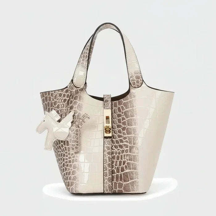 Croc Luxe handbag with crocodile embossed pattern on a white background