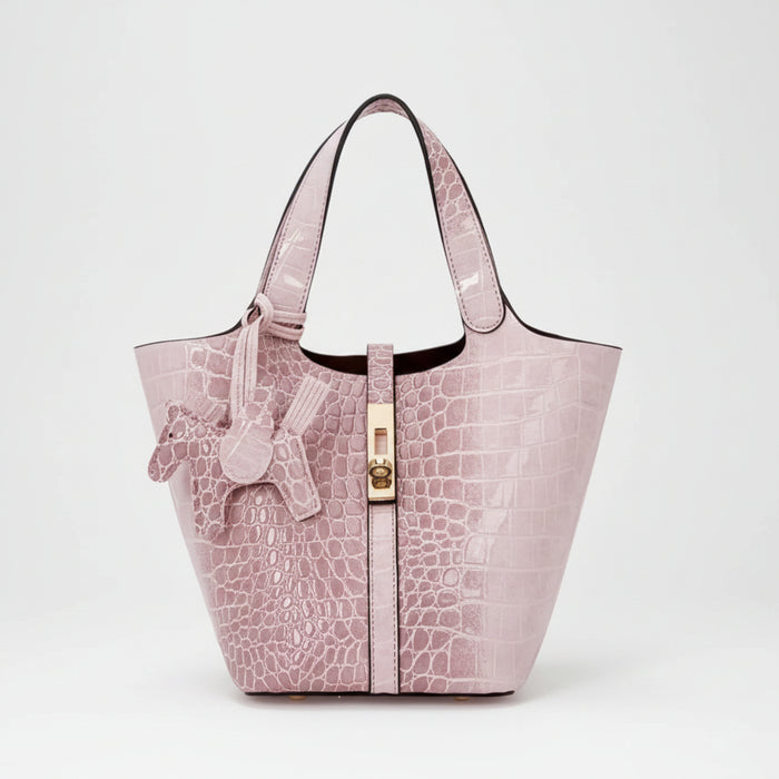Pink crocodile-embossed handbag