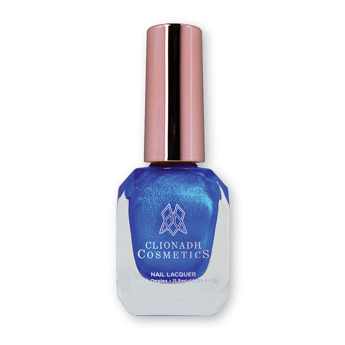 Bottle of nail polish containing Don't Open Inside! Nail Lacquer bottle on white background.