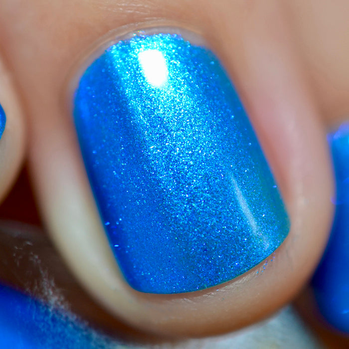 Close-up of one nail painted with Don't Open Inside!! Nail Lacquer on fair skin tone.
