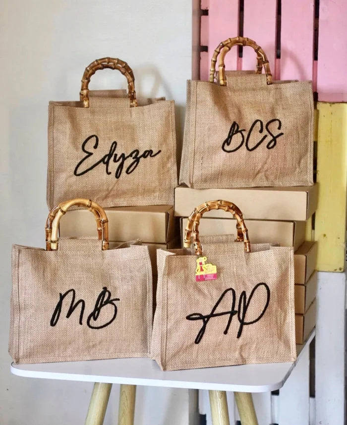 Personalized eco friendly tote bags with bamboo handles and custom initials from Travellers Hat Boutique