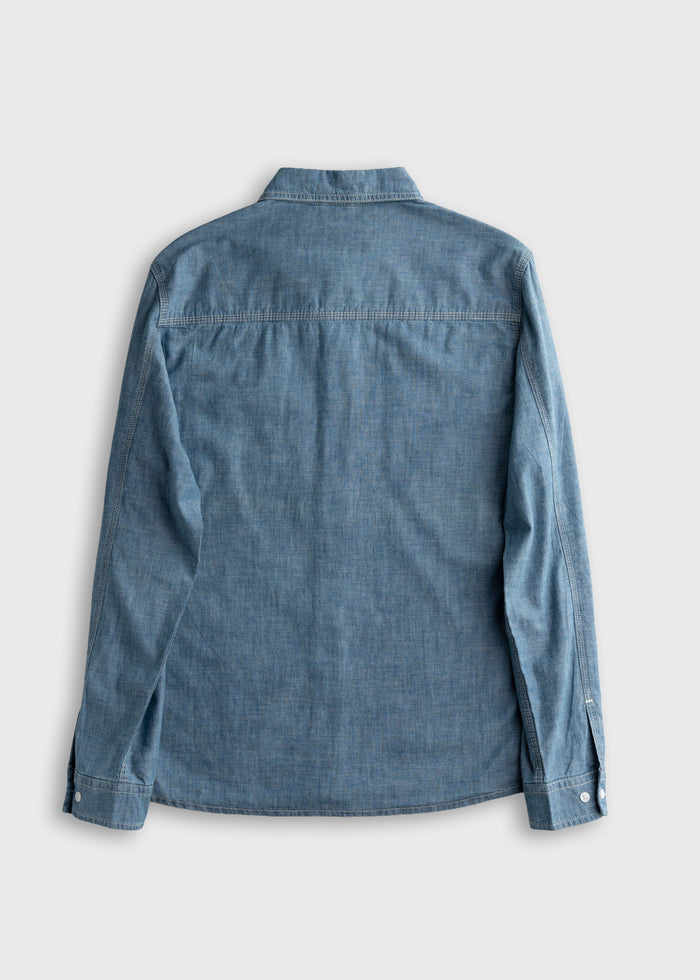 Back view of a blue denim shirt with long sleeves and buttoned cuffs, displayed on a plain gray background.