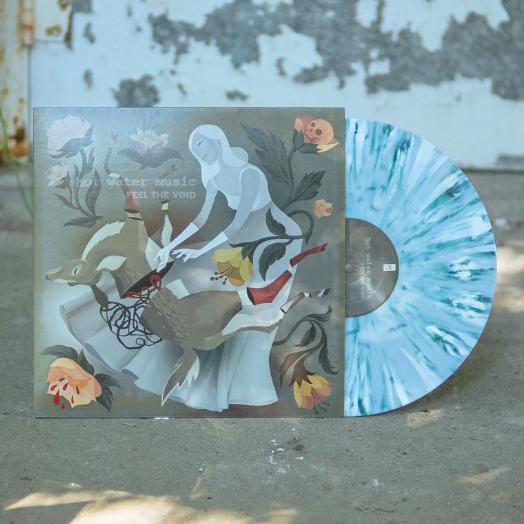 Vinyl jacket with artwork of a woman wearing a long grey dress in the center. The woman is reaching down onto her legs where there is a deer that has been split in half. In each corner is drawings of light pink flowers, one of them having a skull blooming out of it. In the top left corner there is text that lightly says HOT WATER MUSIC and below it there is text that says FEEL THE VOID. There is a blue with white and olive green splattered vinyl peeking out of the side. Both are sitting on top o