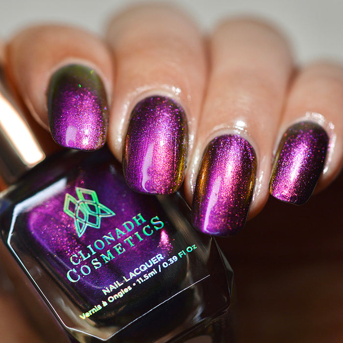 Close up of nails done with Flame-Blown nail lacquer on medium skin tone.