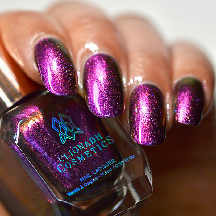 Close up of nails done with Flame-Blown nail lacquer on medium skin tone.