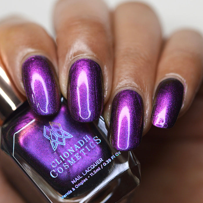 Close up of nails done with Flame-Blown Nail Lacquer on medium skin tone