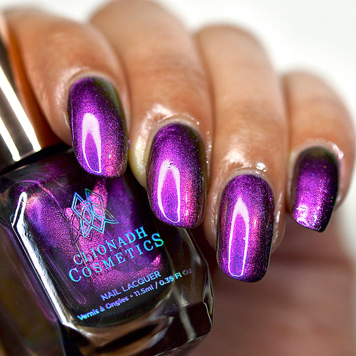 Close up of nails done with Flame-Blown nail lacquer on medium skin tone