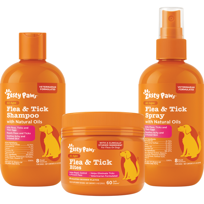 Three orange Zesty Paws flea and tick products: shampoo bottle, bite chews jar, and spray bottle.