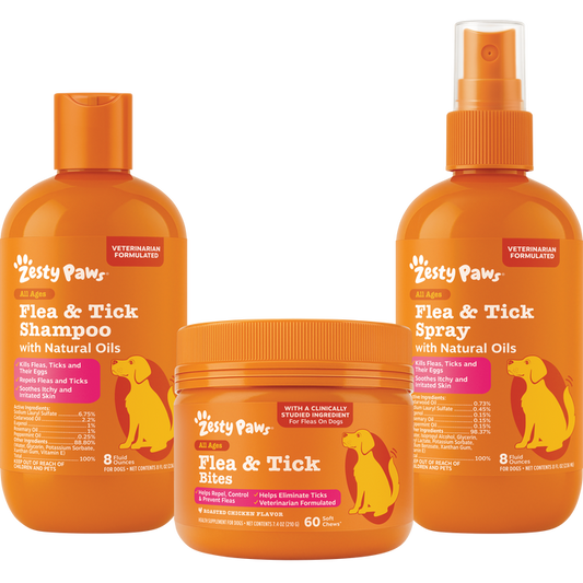 Three orange Zesty Paws flea and tick products: shampoo bottle, bite chews jar, and spray bottle.