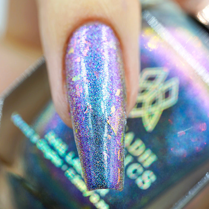 Macro shot of one nail done with Flying Buttress Nail Lacquer on fair skin tone.
