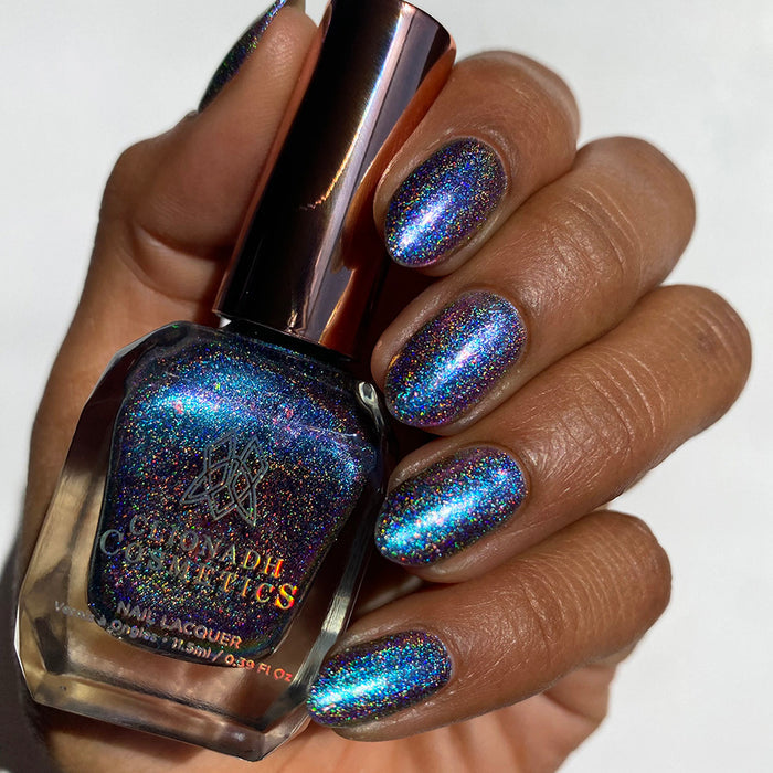 Close up shot of nails done with Flying Buttress Nail Lacquer on medium skin tone.