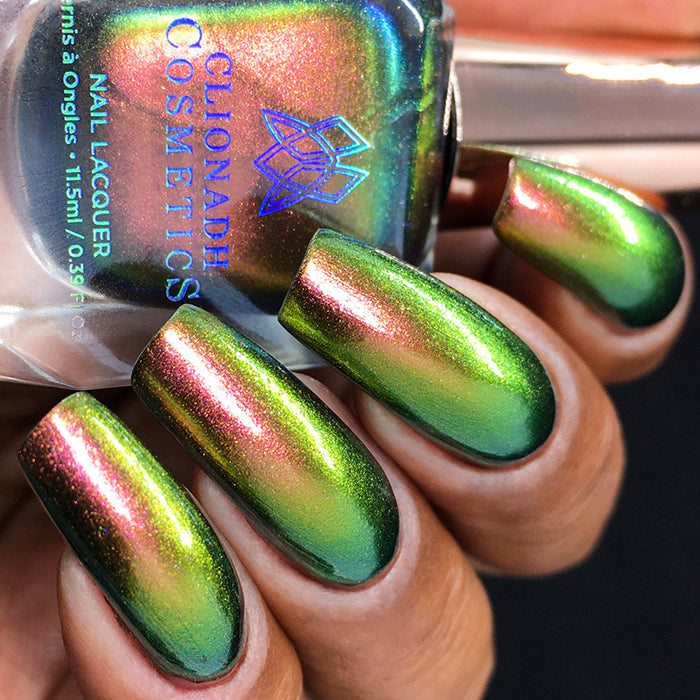 Close up of nails done with Forge Nail Lacquer on medium skin tone.
