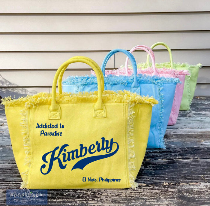 Personalized canvas tote with fringe in yellow blue pink and green colors by Travellers Hat Boutique