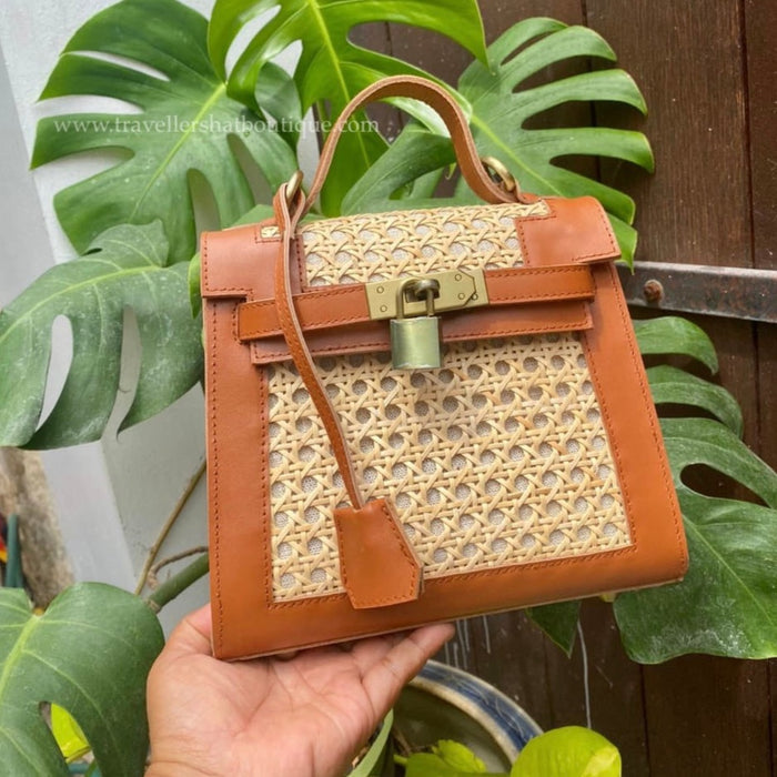 Handheld genuine leather solihiya bag tote with tan leather trim and woven rattan design